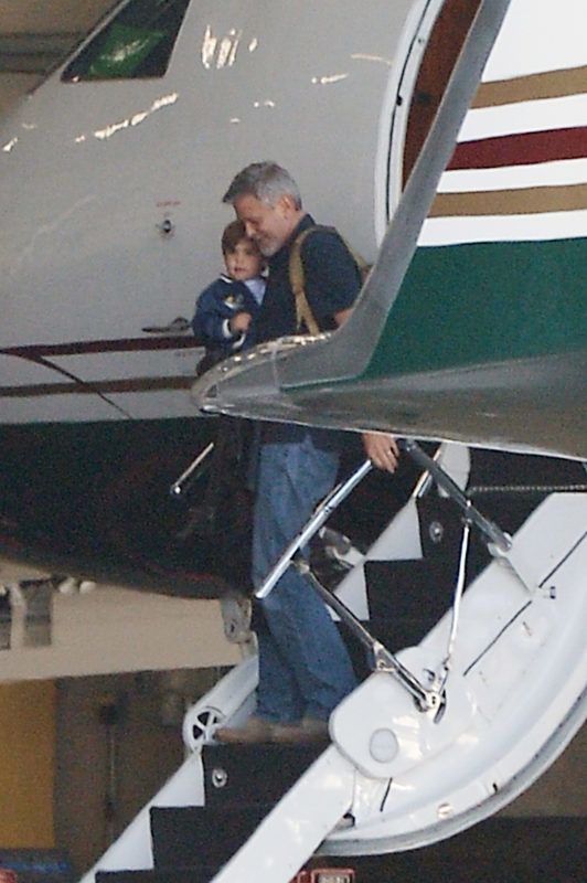 04/28/2019 EXCLUSIVE: George Clooney and Amal Clooney are spotted arriving to an airport in Los Angeles via private jet. The 57 year old actor wore a blue polo shirt and jeans while Amal, 41, looked casual in a striped tank top, and bell bottomed jeans. sales@theimagedirect.com Please byline:TheImageDirect.com *EXCLUSIVE PLEASE EMAIL sales@theimagedirect.com FOR FEES BEFORE USE April 28, 2019
