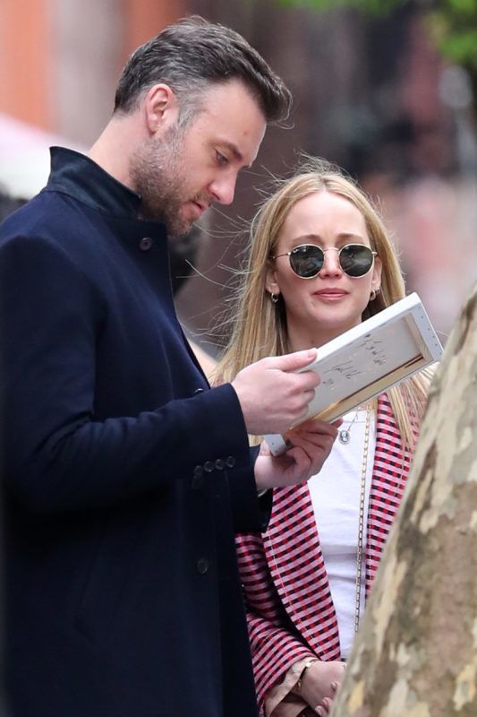 04/29/2019 EXCLUSIVE: Jennifer Lawrence and Cooke Maroney are spotted picking up a self portrait from an artist in New York City before heading off to lunch. Cooke proudly showed off the artwork to a friend which was signed by the artist 'To Jen and Cooke 2019'. The 28 year old actress wore a pink striped jacket, white t-shirt, jeans, and Christian Dior trainers. sales@theimagedirect.com Please byline:TheImageDirect.com *EXCLUSIVE PLEASE EMAIL sales@theimagedirect.com FOR FEES BEFORE USE April 29, 2019