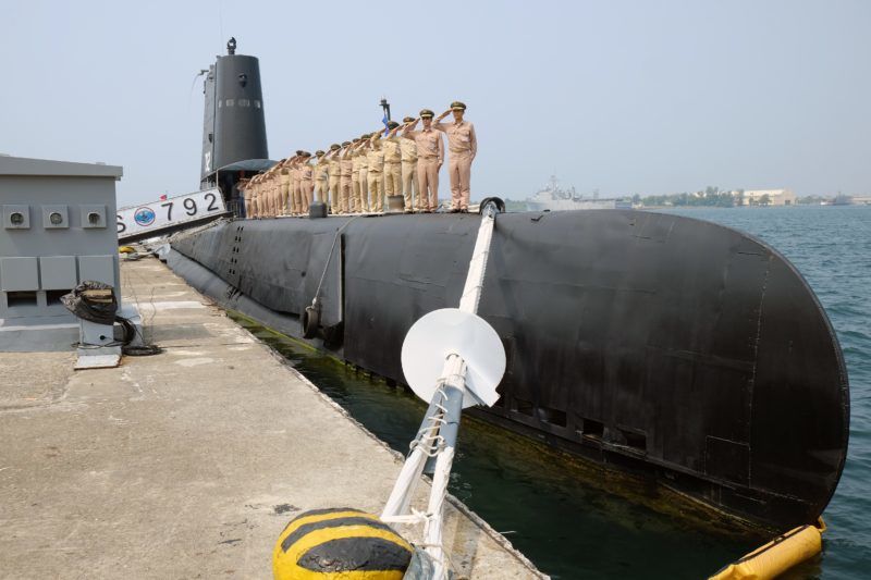 TO GO WITH STORY: Taiwan-US-China-military-submarine by Benjamin YEH Taiwanese navy staffs salute from a US-made Guppy class submarine at the Tsoying navy base in southern Kaohsiung on September 30, 2014. At 70 years old, Taiwan's World War II-era 