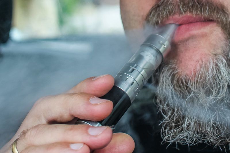 Man vaping while driving a car is seen in Gdansk, Poland on 9 July 2019 Police warn that vaping while driving may increases the risk of car accidents, due to reduced visibility caused by a large cloud of smoke which may momentarily blind drivers (Photo by Michal Fludra/NurPhoto)