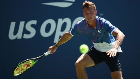 NEW YORK, NEW YORK - AUGUST 26: Marton Fucsovics of Hungary returns a shot during his men's singles first round match against Nikoloz Basilashvili of Georgia during day one of the 2019 US Open at the USTA Billie Jean King National Tennis Center on August 26, 2019 in the Flushing neighborhood of the Queens borough of New York City. (Photo by Clive Brunskill/Getty Images)