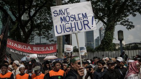 Indonesian Muslim demonstrators stage a protest at the Chinese embassy in Jakarta on December 21, 2018 after Friday noon prayers in support of Muslim Uighurs in China's Xinjiang region. Muslim groups in the world's most populous Muslim country slammed what they called 'repressive' Chinese rule and called for freedom and rights for Muslim Uighurs. The protesters to demand that China stop detaining thousands of minority Uighur Muslims in camps and political indoctrination centers in its Xinjiang region. (Photo by Afriadi Hikmal/NurPhoto)