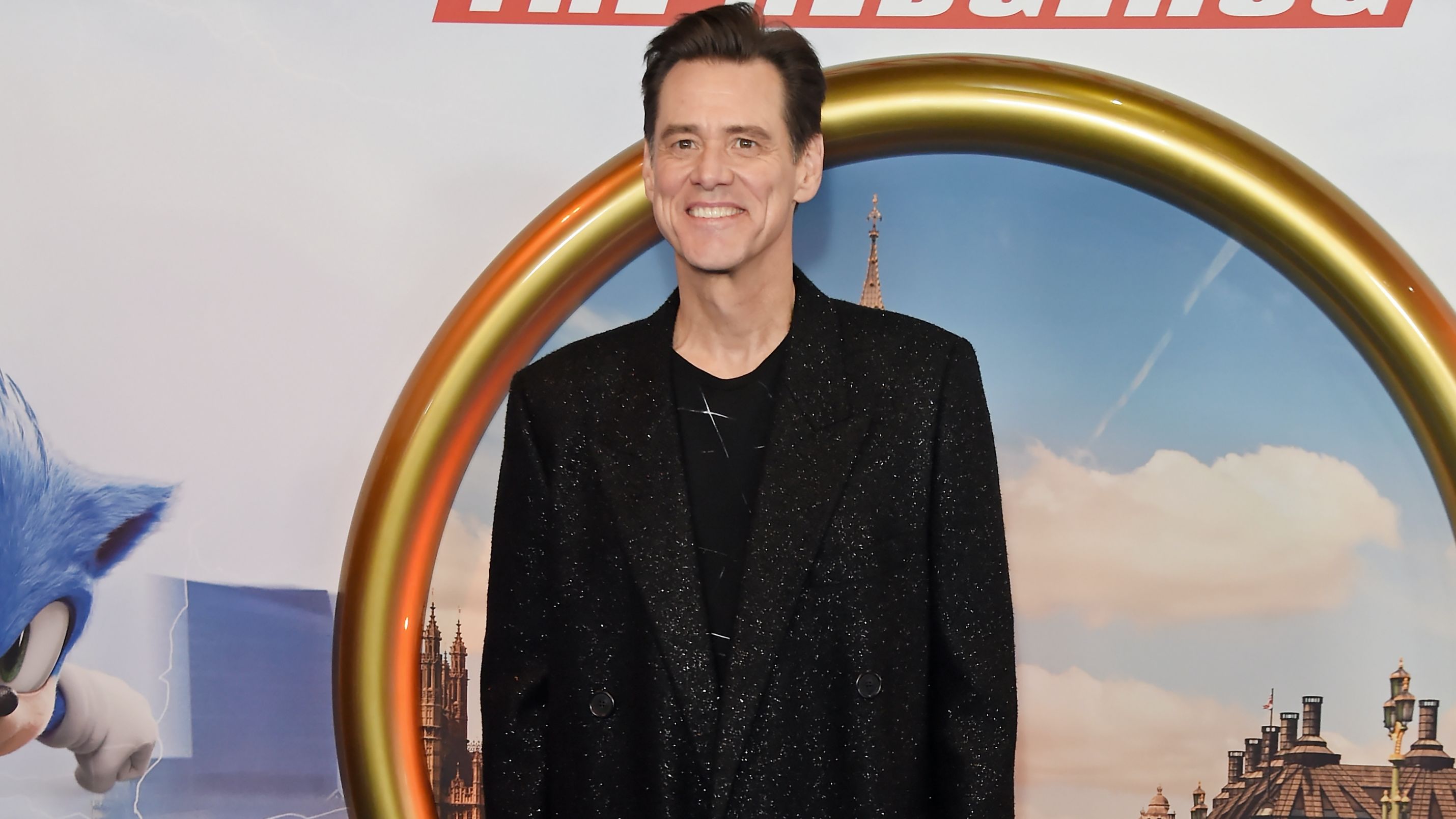 Nem láttuk jönni, de hm, nem is rossz: Jim Carrey csillogós szövetkabátban